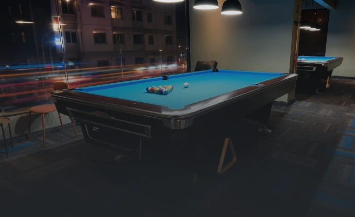 Premium pool table setup in a modern entertainment room at Playcation.